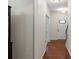 Bright hallway with hardwood floors leads to the front door and a staircase at 2177 Galloway Sw Ln, Concord, NC 28025
