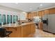 Bright kitchen showcases stainless steel appliances, a breakfast bar, and lots of storage space in the cabinetry at 2177 Galloway Sw Ln, Concord, NC 28025