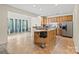 Spacious kitchen boasts stainless steel appliances, a breakfast bar, and an adjacent living area with bright windows at 2177 Galloway Sw Ln, Concord, NC 28025