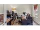 Functional home office space with storage, a desk, and natural light, ideal for remote work and productivity at 2177 Galloway Sw Ln, Concord, NC 28025