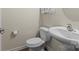 Bathroom features a white sink and toilet at 2177 Galloway Sw Ln, Concord, NC 28025