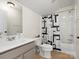 Practical bathroom featuring a combination tub/shower, modern fixtures, and tile flooring at 2907 Blackburn Dr, Waxhaw, NC 28173