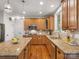 Updated kitchen featuring granite countertops, stainless steel appliances, and custom maple cabinetry at 2907 Blackburn Dr, Waxhaw, NC 28173