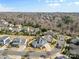 Expansive aerial view of a suburban neighborhood featuring well-manicured lawns and mature trees at 3013 Arsdale Rd, Waxhaw, NC 28173