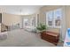 Bright bedroom with large windows, neutral tones, and plush carpeting offers a cozy retreat at 3013 Arsdale Rd, Waxhaw, NC 28173