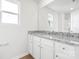 Bathroom featuring a white vanity with granite countertops at 3418 Saddlebred Dr, Gastonia, NC 28052