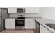 Well-equipped kitchen featuring stainless steel appliances, granite countertops, and white cabinets at 3418 Saddlebred Dr, Gastonia, NC 28052