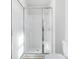 Glass enclosed shower with chrome hardware and built in shelving at 3418 Saddlebred Dr, Gastonia, NC 28052