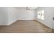 Spacious living room featuring hardwood floors, a ceiling fan, and plenty of natural light at 407 S Spargo St, Dallas, NC 28034