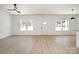 Living room with luxury vinyl flooring, abundant natural light, and modern fixtures at 407 S Spargo St, Dallas, NC 28034
