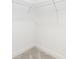 Walk-in closet with gray carpet and white wire shelving at 409 S Spargo St, Dallas, NC 28034