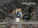 Aerial view of property including adjacent homes, lawn and driveway at 427 Queens Ct, Gastonia, NC 28052