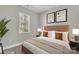 Cozy bedroom with natural light and neutral decor offers a relaxing retreat at 427 Queens Ct, Gastonia, NC 28052