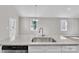 Modern kitchen island with granite countertops and stainless steel sink at 427 Queens Ct, Gastonia, NC 28052