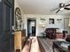 Inviting living room features hardwood floors, a stylish mirror, and an elegant leather sofa at 4516 Jamee Dr, Gastonia, NC 28056