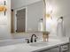 Modern bathroom featuring a sleek vanity with decorative mirror, stylish lighting and neutral color scheme for a clean feel at 5005 Autumn Blossom Ln, Waxhaw, NC 28173
