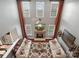 Stunning living room with soaring ceilings, a stone fireplace, hardwood floors, and comfortable seating at 5005 Autumn Blossom Ln, Waxhaw, NC 28173