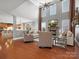 Spacious living room featuring a fireplace, hardwood floors, and an open layout at 5005 Autumn Blossom Ln, Waxhaw, NC 28173