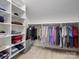 Walk-in closet with extensive shelving and hanging space for optimal organization and easy access to your wardrobe at 5005 Autumn Blossom Ln, Waxhaw, NC 28173
