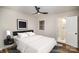 Cozy bedroom with minimalist decor, a comfortable bed, and a view to the bathroom at 5310 Myrica Ln, Charlotte, NC 28213