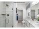 A bright and modern bathroom with tiled shower, sleek vanity, and neutral finishes at 6010 Fonsac Ln # 2006C, Charlotte, NC 28217