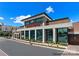 Modern commercial building featuring large windows, neutral colors, and prominent signage at 6010 Fonsac Ln # 2006C, Charlotte, NC 28217