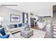 Living room shows open floorplan, lots of natural light, view into kitchen and dinette at 6010 Fonsac Ln # 2006C, Charlotte, NC 28217
