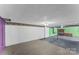 Spacious unfinished basement with painted walls, concrete floors, and ample storage at 605 18Th Nw St, Hickory, NC 28601