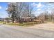 Charming single-story home with a welcoming front porch and a well-maintained lawn at 605 18Th Nw St, Hickory, NC 28601