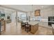 Modern kitchen with a large island, pendant lighting, stainless steel appliances, and open layout at 623 Plowshare Way, Clover, SC 29710