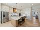 Bright, modern kitchen with stainless steel appliances, stylish countertops, and a large island at 623 Plowshare Way, Clover, SC 29710