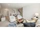 Inviting living area featuring neutral tones, comfortable furniture, and a cozy atmosphere at 623 Plowshare Way, Clover, SC 29710