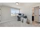 Bright office featuring a large window, modern computer setup, and minimalist desk at 623 Plowshare Way, Clover, SC 29710