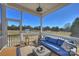 Enjoy the outdoor space with this inviting screened porch and scenic backyard views at 623 Plowshare Way, Clover, SC 29710