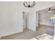 Bright and open floor plan living room featuring wood-look floors and recessed lighting at 695 S Elm St, Statesville, NC 28677