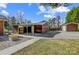Large garage with multiple bays and a carport, perfect for storage and parking at 7201 Cedarfield Rd, Charlotte, NC 28227
