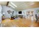 Inviting living room with vaulted ceilings, hardwood floors, natural light, and an open layout at 7201 Cedarfield Rd, Charlotte, NC 28227