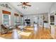 Versatile living area featuring hardwood floors, natural light, and an open layout at 7201 Cedarfield Rd, Charlotte, NC 28227