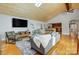 Spacious living room with a vaulted ceiling, hardwood floors, and an open-concept design at 7201 Cedarfield Rd, Charlotte, NC 28227