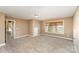 Neutral bonus room with carpet, closet, and window letting in plenty of natural light at 8137 Caliterra Dr, Charlotte, NC 28227