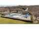 Aerial view of the community pool and clubhouse, offering a great spot for neighborhood gatherings at 8606 Chatsworth Ln, Waxhaw, NC 28173
