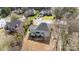 Aerial view showcasing a home's backyard with large patio area at 8606 Chatsworth Ln, Waxhaw, NC 28173