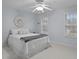 Cozy bedroom with neutral paint, white bedding, and natural light from the windows at 8606 Chatsworth Ln, Waxhaw, NC 28173