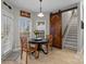 Charming breakfast nook area featuring modern floors, natural lighting, and a cozy round table at 8606 Chatsworth Ln, Waxhaw, NC 28173
