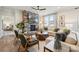 Inviting living room with stone fireplace, comfortable seating, and ample natural light at 960 Exeter Dr, Sherrills Ford, NC 28673