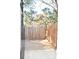 Wooden fenced backyard with a deck creates a private outdoor space at 12742 Spirit Bound Way, Charlotte, NC 28273