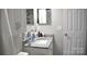 Cozy bathroom with granite countertop, white cabinets, and ample storage space at 12742 Spirit Bound Way, Charlotte, NC 28273