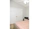 Neutral bedroom showcasing a large closet with white doors, and a comfy bed at 12742 Spirit Bound Way, Charlotte, NC 28273