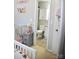 Bedroom view with an adjacent bathroom featuring a white cabinet and toilet at 12742 Spirit Bound Way, Charlotte, NC 28273
