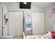 This bedroom offers a TV and multiple closets for ample storage at 12742 Spirit Bound Way, Charlotte, NC 28273